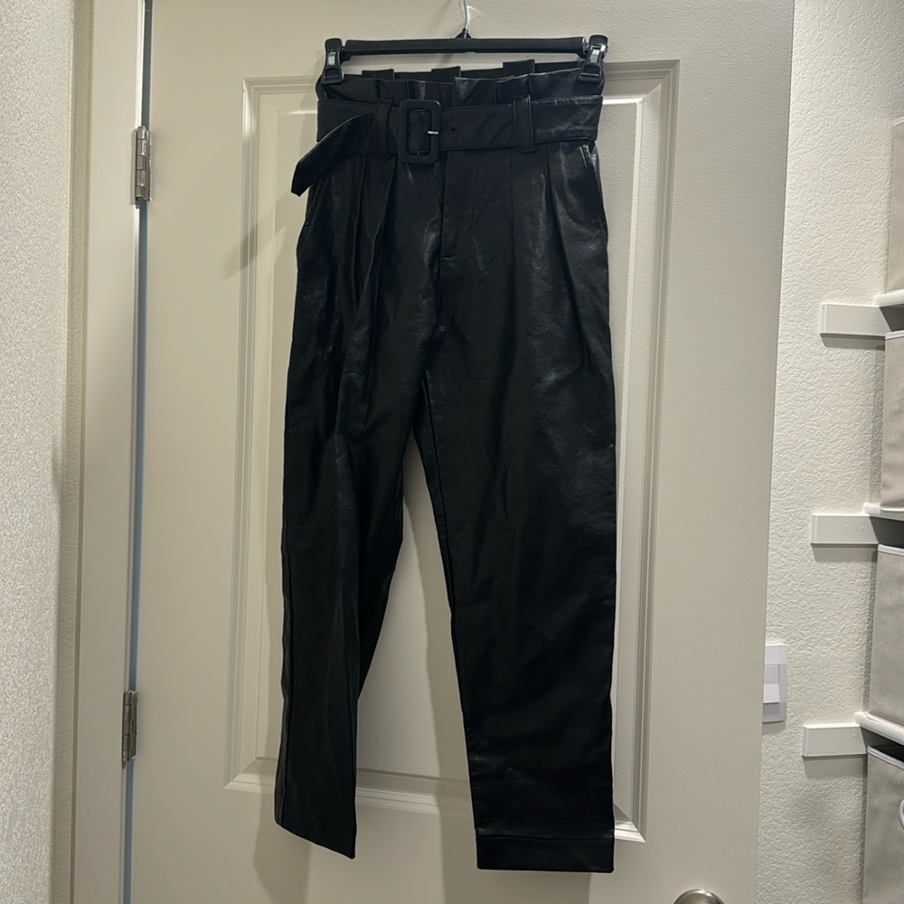 Black leather trousers with belt